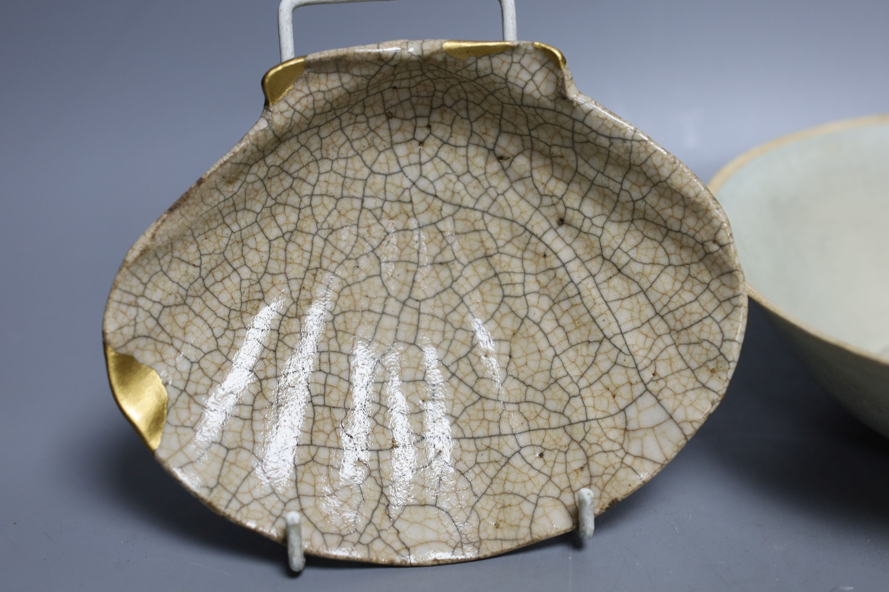 A Chinese Qingbai bowl and a Ge ware type shell dish, Yuan dynasty or later. Largest 18cm diameter